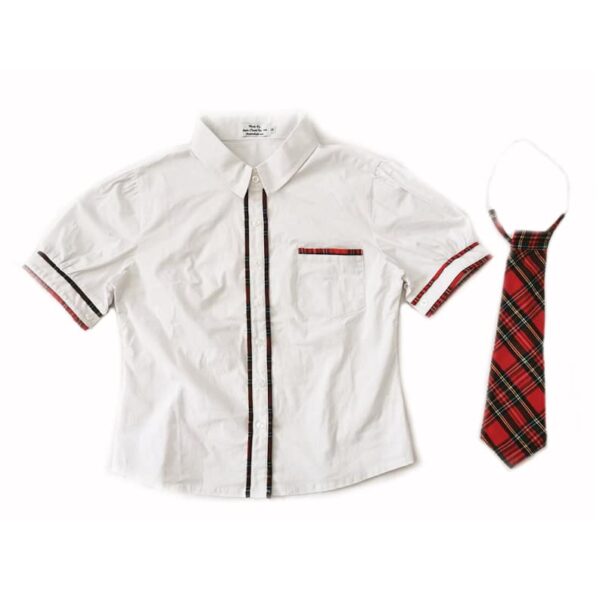 White button shirt with red plaid accents and matching tie.